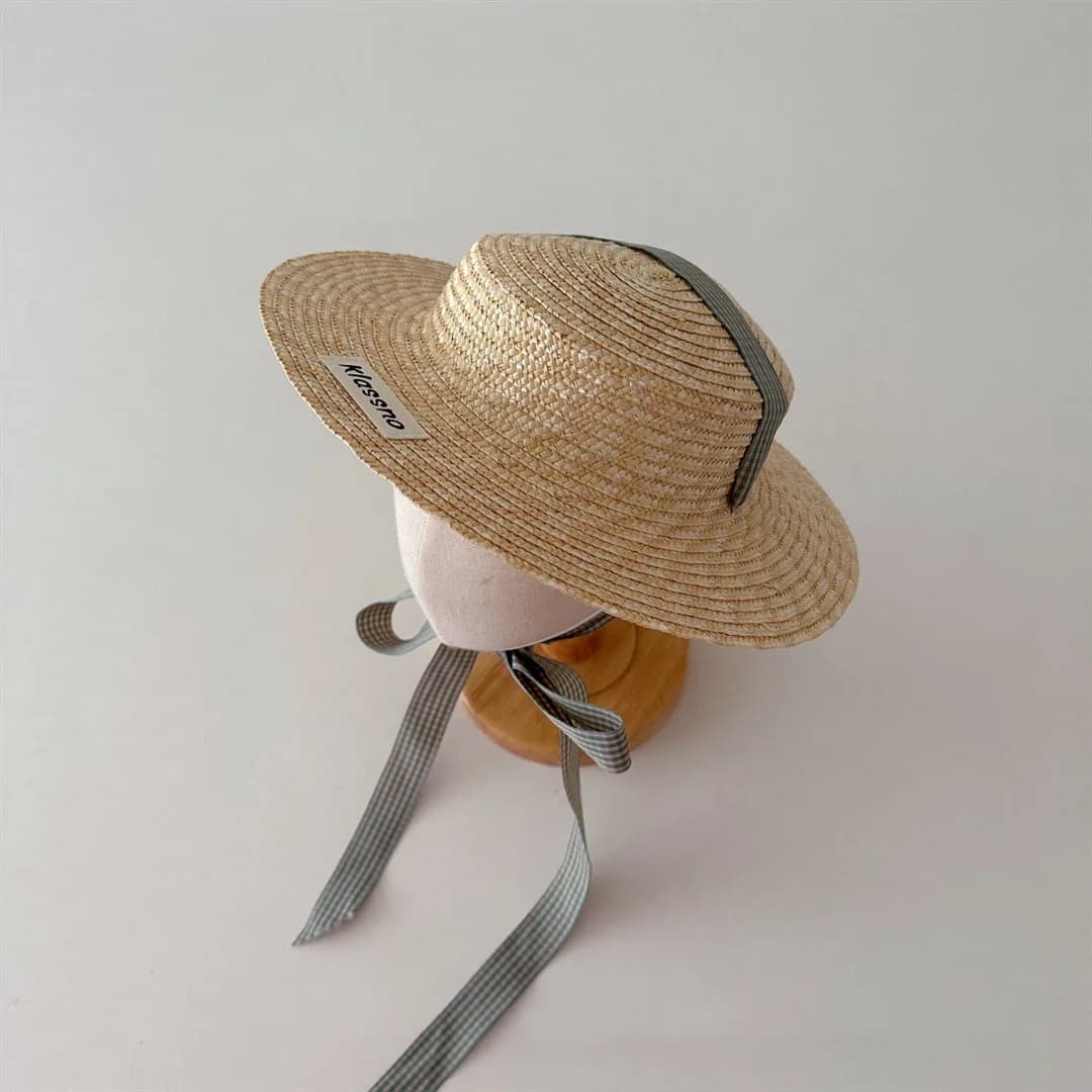 Cappello di paglia per bambini coreani Cappello estivo per bambini Panama Berretti da spiaggia Cappello da sole per bambini in paglia di grano a tesa