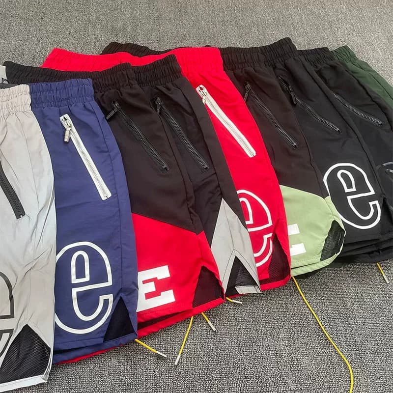 Pantaloncini sportivi Rhude di tendenza estiva, pantaloncini casual larghi e traspiranti con patchwork multicolore High Street