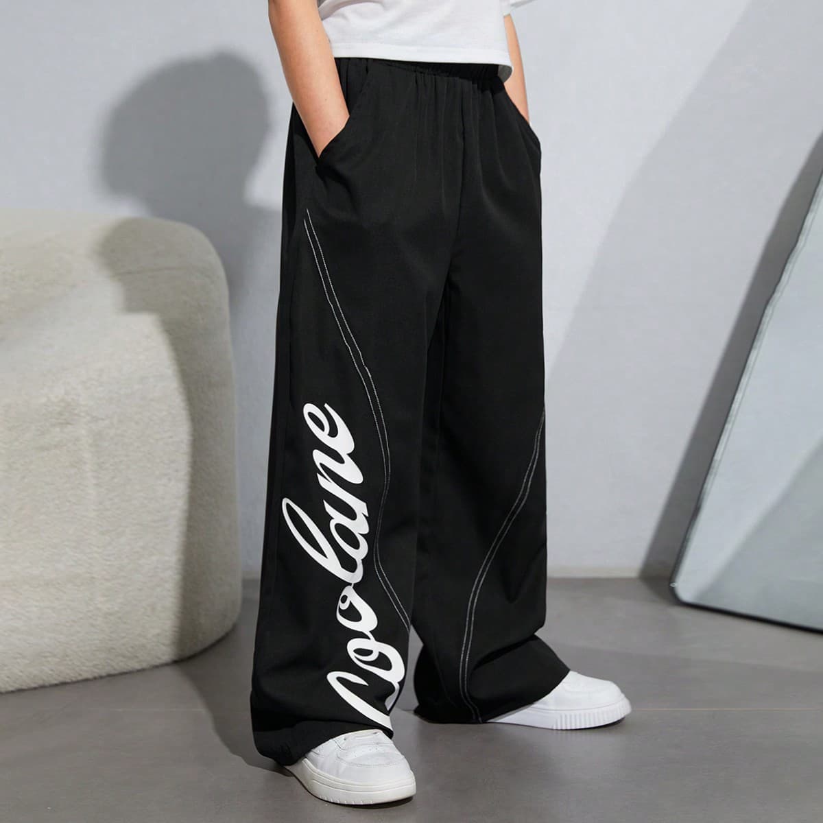 Pantaloni lunghi casual sportivi per ragazzi adolescenti, con stampa a lettere e righe a contrasto, modello ampio e tessuto