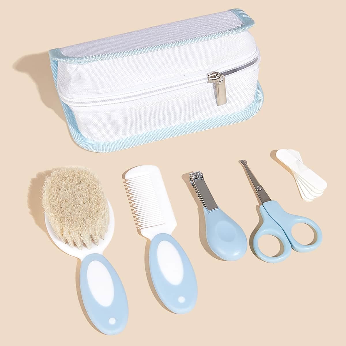 Set di 5 pezzi per la cura del bebè in borsa blu, include pettine, spazzola, tagliunghie e altri strumenti per la cura del bebè