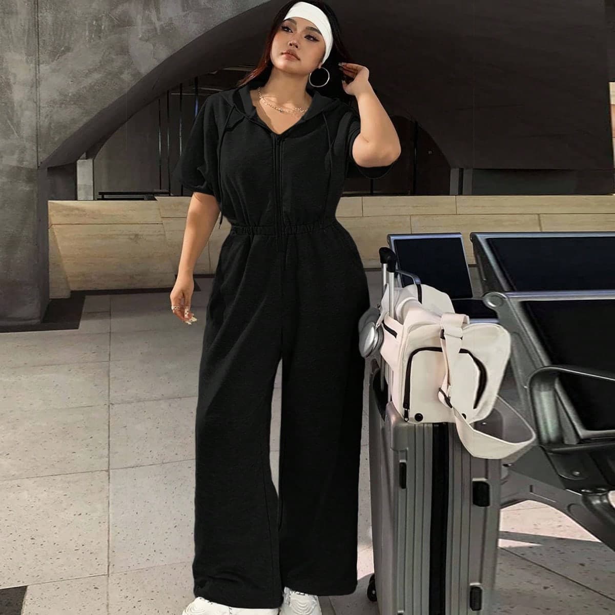 Tuta con cappuccio casual nera taglie forti