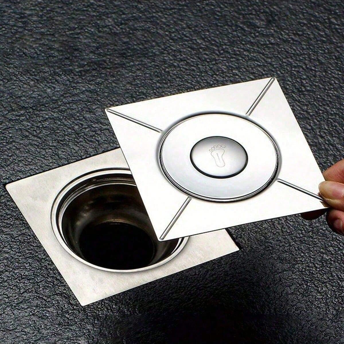 Scarico universale per pavimento del bagno, design arrotondato, anti-intasamento, drenaggio rapido, adatto per ristrutturazioni e nuove installazioni.
