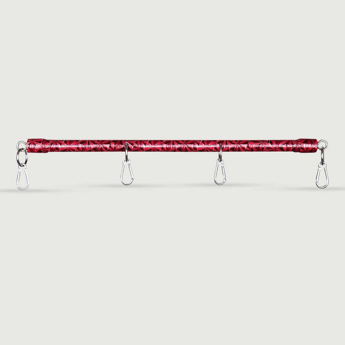 Barretta con texture in pelle goffrata e anelli in metallo - Rosso