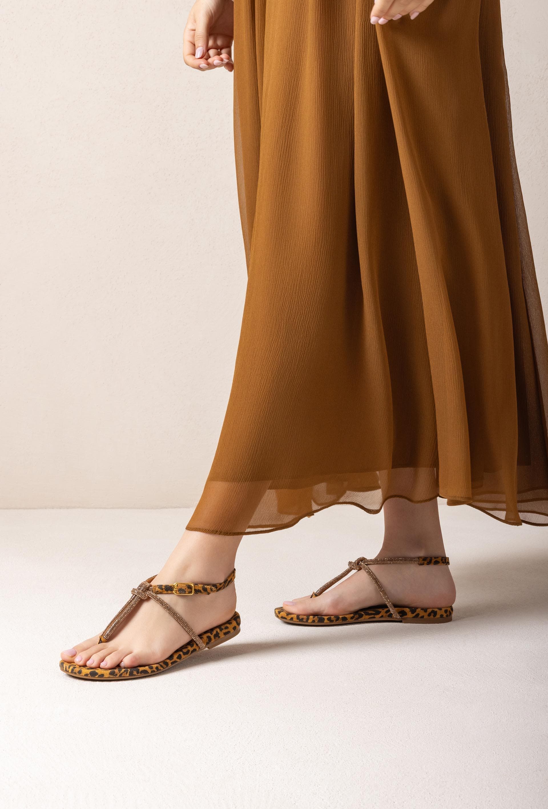 Platte glanzende sandalen